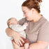 Mum cuddling her baby in the brown and white striped Mackenzie breastfeeding tee by Milky Threads Co