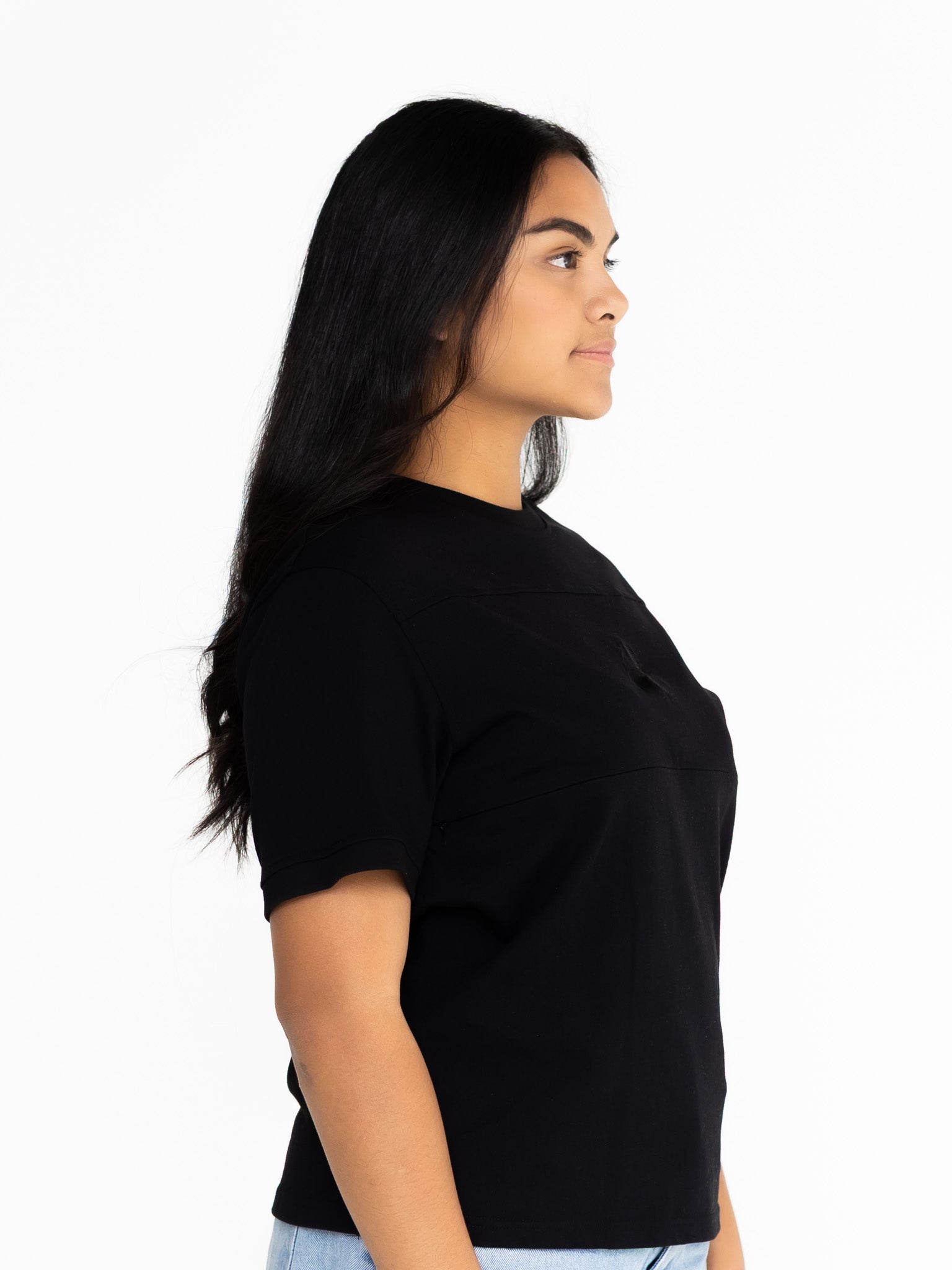 Side view of the black Indiana boyfriend tee showing the relaxed oversized fit