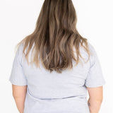 Back view of the light grey Indiana breastfeeding tee