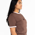 Side view of the brown and pink Indiana boyfriend tee showing the oversized fit