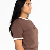 Side view of the brown and pink Indiana boyfriend tee showing the oversized fit
