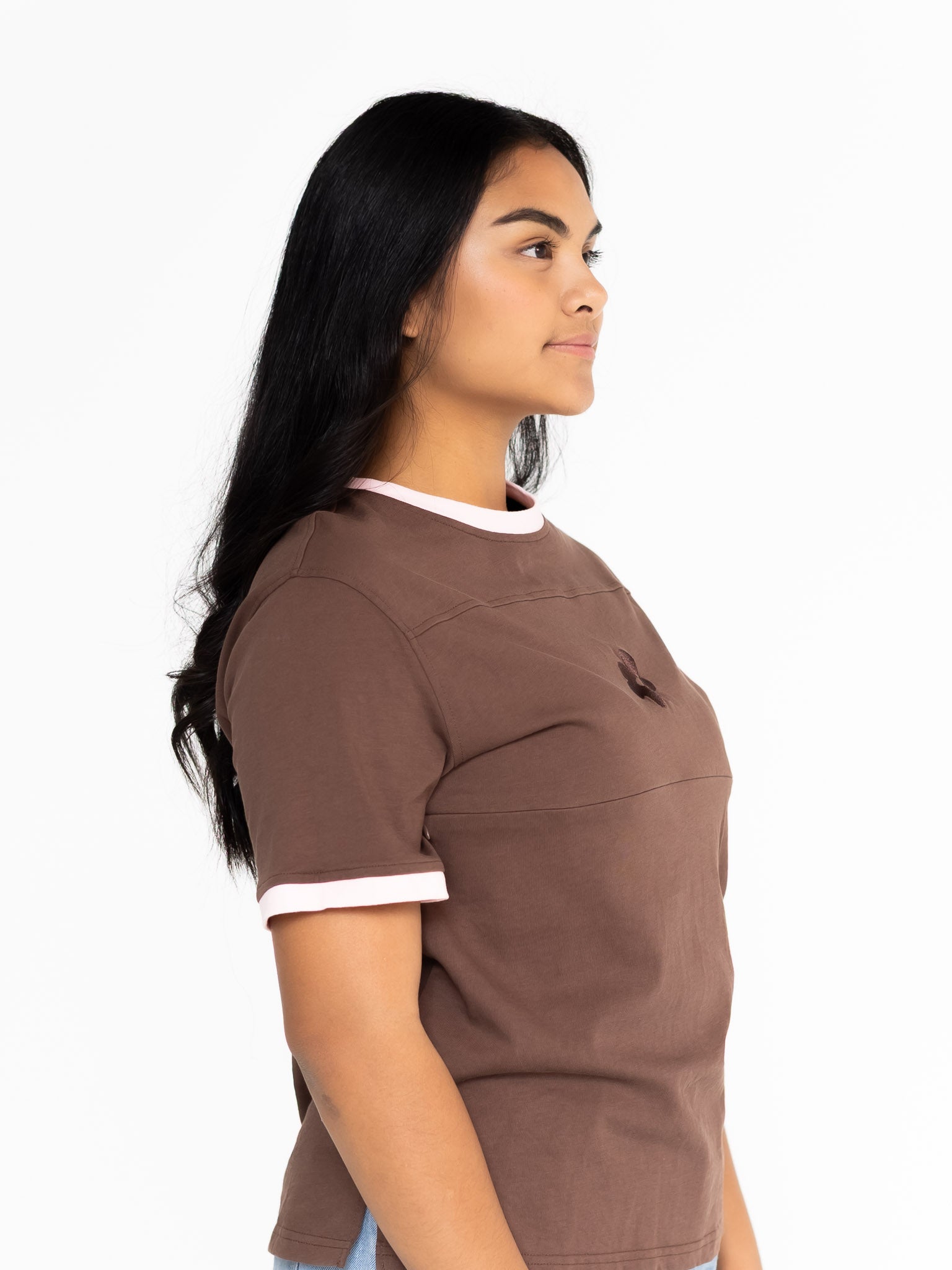 Side view of the brown and pink Indiana boyfriend tee showing the oversized fit