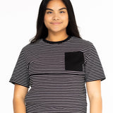 Front view of the Mackenzie breastfeeding tee in black and white stripes with a black chest pocket