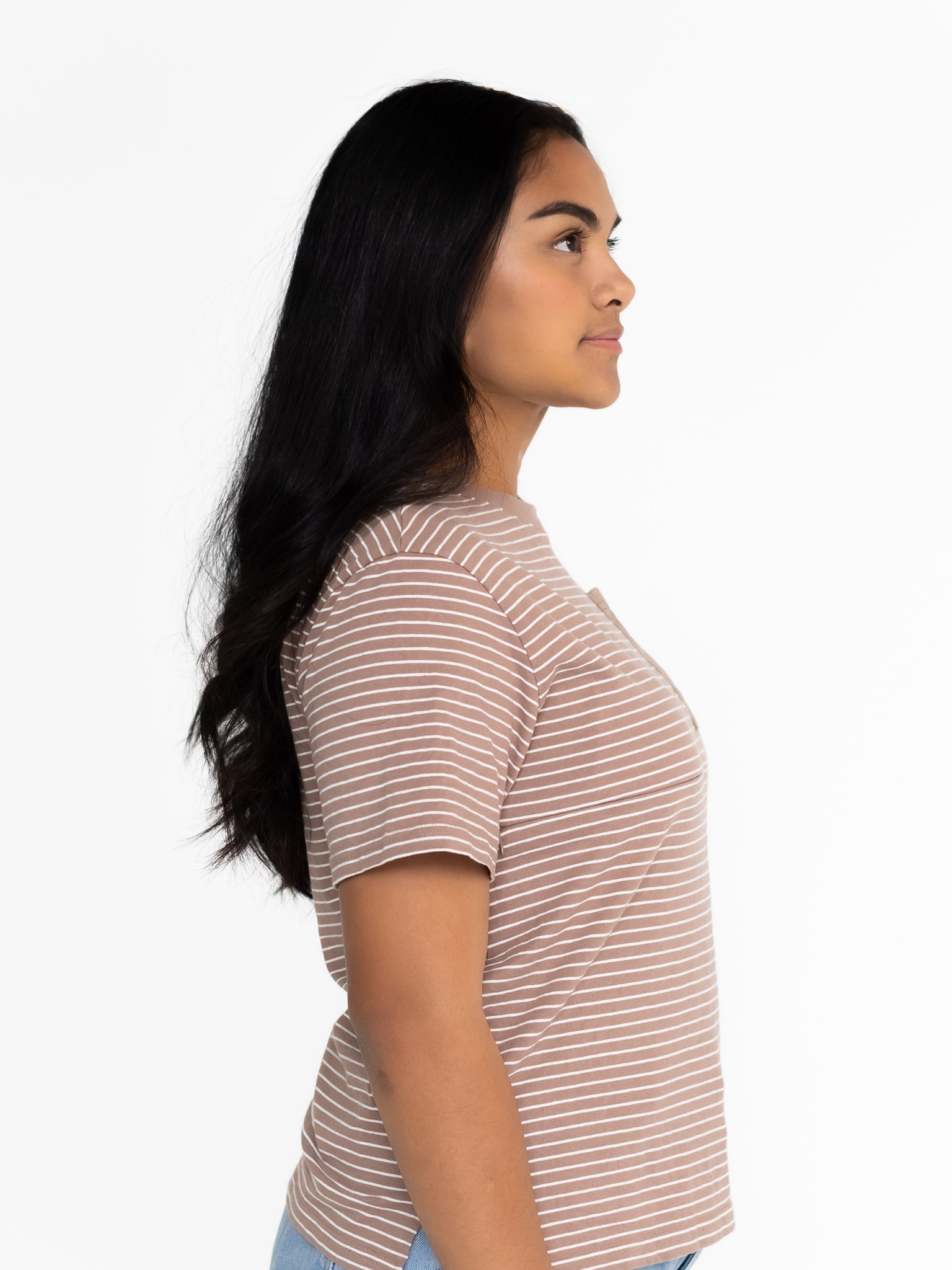 Side view of the brown striped Mackenzie tee showing the relaxed oversized fit